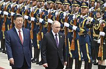  Putin review the honor guard during an official welcome ceremony in Beijing, China, Thursday, May 16, 2024..