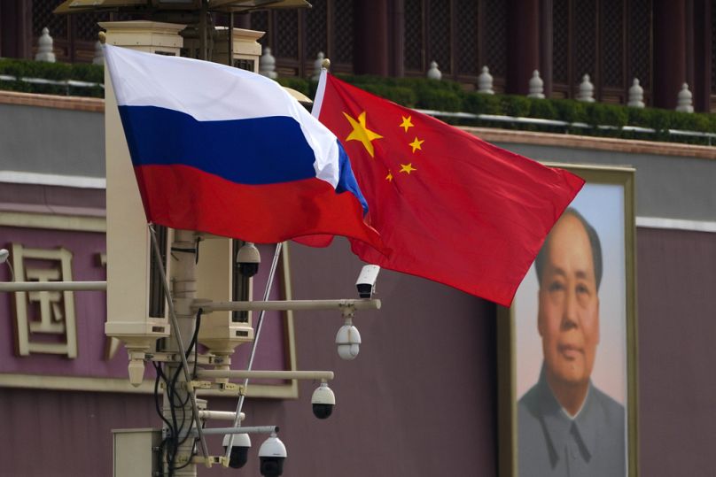 Chinese and Russian flags in Beijing 16/05/24.