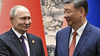 Chinese President Xi Jinping, right, and Russian President Vladimir Putin shake hands prior to their talks in Beijing, China, on Thursday, May 16, 2024.