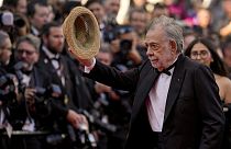 Director Francis Ford Coppola poses for photographers upon arrival at the premiere of the film 'Megalopolis' 