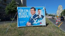 Damaged AfD poster in Berlin
