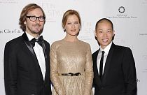 President and CEO of Van Cleef & Arpels Nicolas Bos, model Carolyn Murphy and designer Jason Wu attend a gala in New York. Wednesday, Feb. 16, 2011.