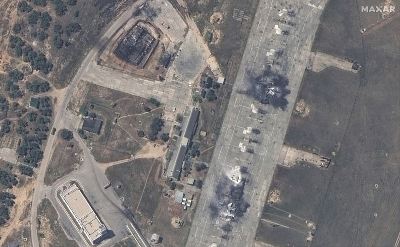 This image released by Maxar Technologies shows an overview of destroyed MiG 31 fighter aircraft and fuel storage facility at Belbek air base, near Sevastopol, in Crimea, Thur