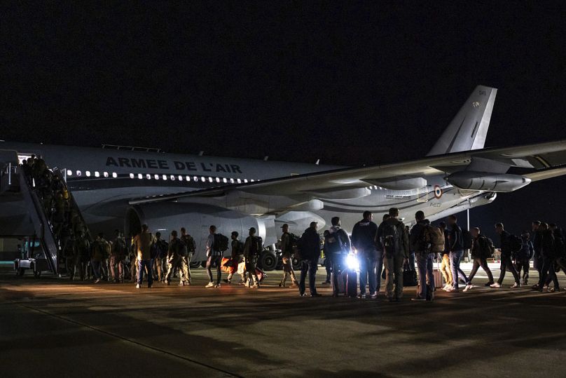 French security force embarking a plane to New Caledonia, Thursday, May 16, 2024 at the Istres military base in France