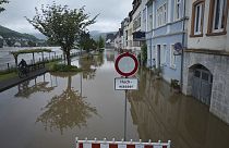 The Moselle rises above the edge of the flood protection wall and flooded large parts of the old town Zell, Germany