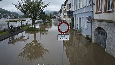 The Moselle rises above the edge of the flood protection wall and flooded large parts of the old town Zell, Germany