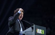 Argentina's president Javier Milei gestures as he delivers a speech on stage during the Spanish far-right wing party Vox's rally "Europa Viva 24" in Madrid, Spain, Sunday, May