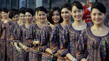 مهماندازان شرکت هواپیمایی ملی سنگاپور به تاریخ ۲۰ سپتامبر ۲۰۱۵