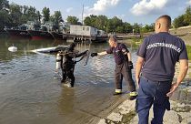 A damaged boat at the northern edge of Budapest where it was towed after being discovered in the water by police following a boat collision on the Danube, May 19, 2024