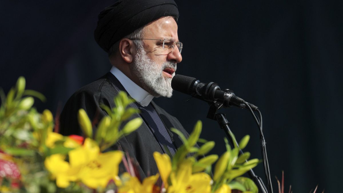 FILE - President Ebrahim Raisi addresses the crowd in the annual rally commemorating Iran's 1979 Islamic Revolution in Tehran, Iran, Sunday, Feb. 11, 2024.