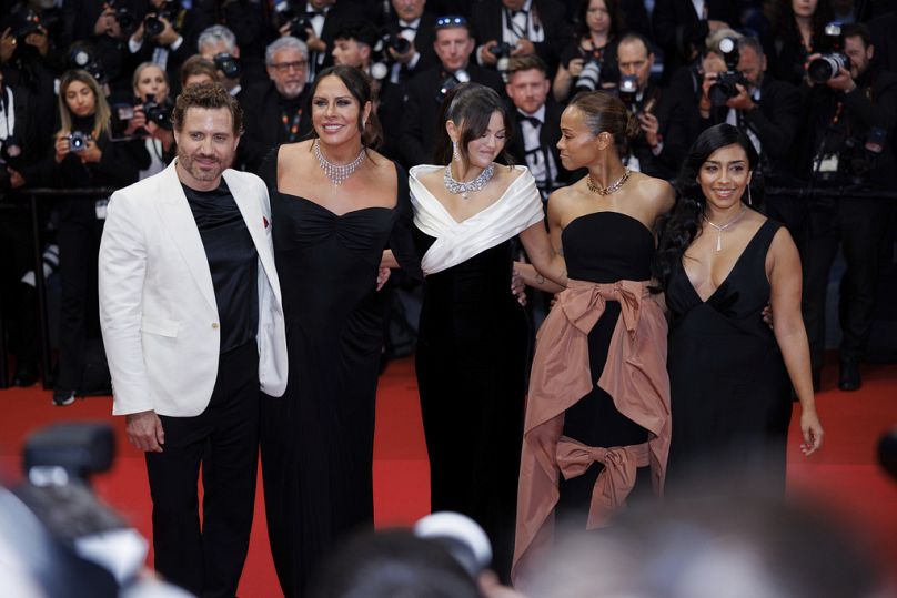 Edgar Ramirez, Karla Sofia Gascon, Selena Gomez, Zoe Saldana, and Adriana Paz pose after the 'Emilia Perez' premiere, 18 May 2024.