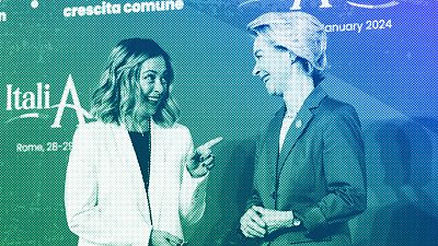 Italian Premier Giorgia Meloni shares a light moment as she welcomes European Commission President Ursula von der Leyen in Rome, January 2024