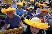 Climate activists participate in a rally demanding actions to stop the climate crisis, in Seoul, South Korea, September 23, 2023. 