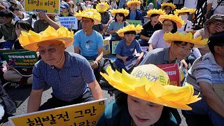 Climate activists participate in a rally demanding actions to stop the climate crisis, in Seoul, South Korea, September 23, 2023. 