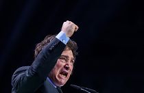 Argentina's president Javier Milei gestures as he delivers a speech on stage during the Spanish far-right wing party Vox's rally "Europa Viva 24" in Madrid, 19 May 2024