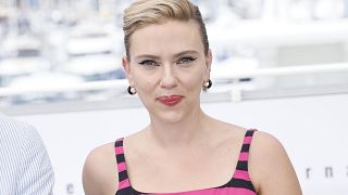 Scarlett Johansson poses for photographers in Cannes, 2023.
