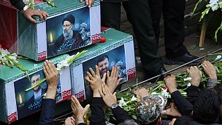 Thousands of Iranians surround late president's coffin as 5-day mourning starts