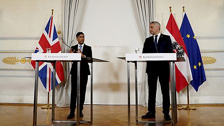 Britain's Prime Minister Rishi Sunak, left, and Austrian Chancellor Karl Nehammer attend a joint news conference in Vienna, Austria, Tuesday, May 21, 2024.