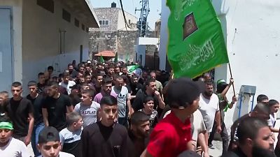 Mourners attended the funeral of Allam Jaradat, a Palestinian teacher killed by Israeli forces on his way to work during a raid in Jenin