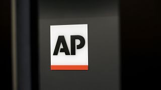 Israel accuses AP news agency of violating a controversial media law then backpedals