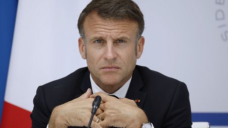 French President Emmanuel Macron attends a video conference as part as the AI Summit Seoul 2024 from the Elysee Palace in Paris, Tuesday, May, 21, 2024.