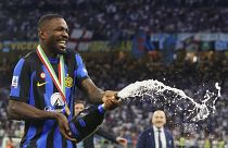 Inter's Marcus Thuram celebrates their victory of the "scudetto" after the Serie A soccer match between Inter and Lazio at the San Siro Stadium in Milan on 19 May 2024