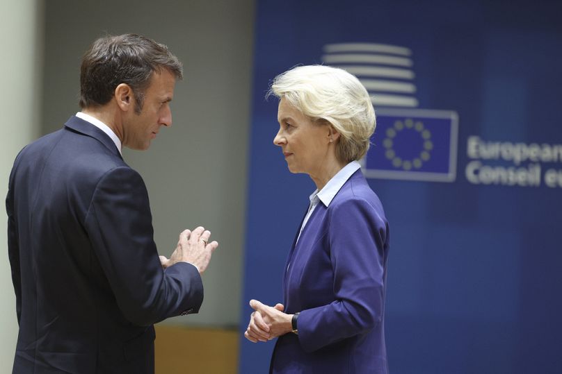 France&apos;s President Emmanuel Macron, left, speaks with European Commission President Ursula von der Leyen