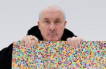 Damien Hirst with the Currency