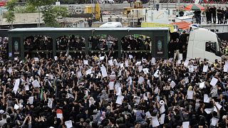Thousands attend funeral procession as Iran buries President Raisi 