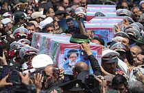 In this photo released by the Iranian Presidency Office, flag-draped coffins of the President Ebrahim Raisi and his companions who were killed in a helicopter crash on Sunday.