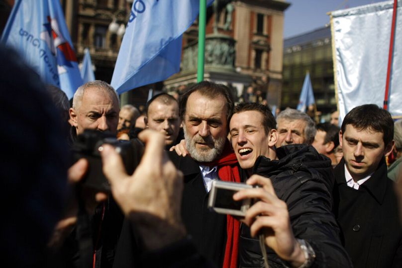 Vuk Draskovic, center, the veteran charismatic Serbian opposition leader,