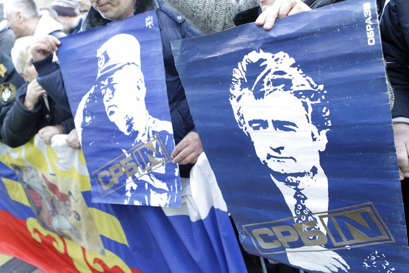 banners of the former Bosnian Serb leaders Radovan Karadzic and Ratko Mladic