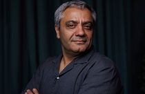 Iranian director Mohammad Rasoulof poses for a portrait photograph for the film 'The Seed of the Sacred Fig' at the 77th international film festival, Cannes