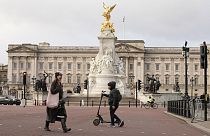 A general view of Buckingham Palace one, of the official residences of King Charles III, as pedestrians walk past in London, Tuesday, Feb. 6, 2024.