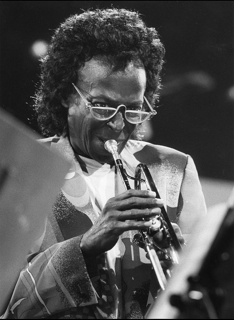 Miles Davis performs in 1991 at the Jazz-Festival in Montreaux, Switzerland. Davis appeared for the first time at the Newport Jazz Festival in 1955