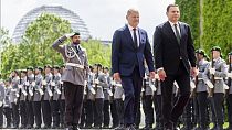 German Chancellor Olaf Scholz, centre, and Portugal's Prime Minister Luis Montenegro walk during their meeting at the Federal Chancellery in Berlin, Friday, May 24, 2024.