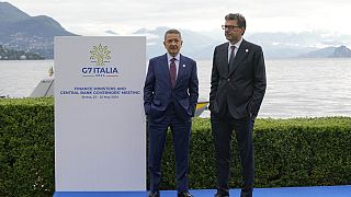 Italy's Finance Minister Giancarlo Giorgetti and Bank of Italy Governor Fabio Panetta await their counterparts at the G7 Finance Ministers meeting in Stresa, northern Italy.