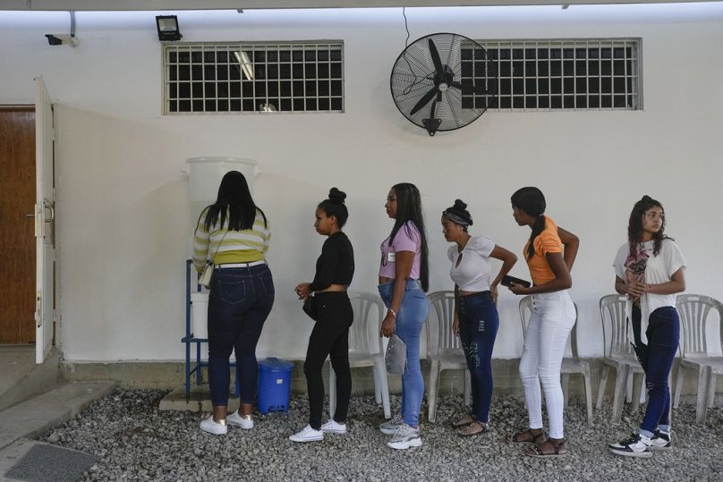 Patients wait their turn to enter a Doctors without Borders medical clinic in Putucual, Venezuela, January 2024