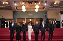 Director Michel Hazavanicius and leading crew of 'The Most Precious of Cargoes' line up at the Cannes premiere on May 24, 2024.