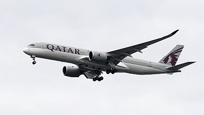FILE - In this Nov. 7, 2019, file photo, a Qatar Airways jet approaches Philadelphia International Airport in Philadelphia. 