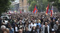 Protesters attend a rally against Prime Minister Nikol Pashinyan in Yerevan, Armenia, Sunday, May 26, 2024.