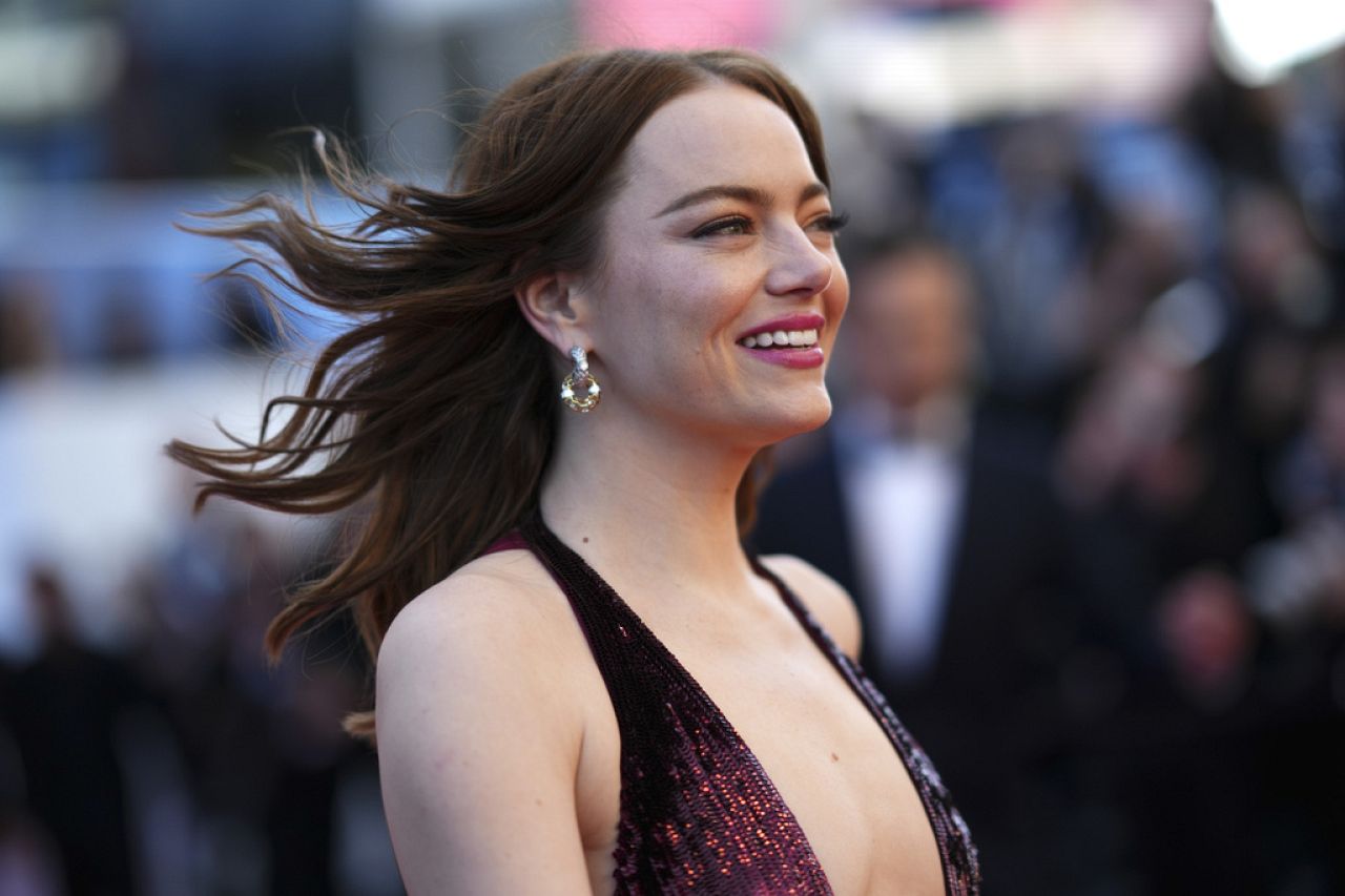 Emma Stone poses for photographers upon arrival at the premiere of the film 'Kinds of Kindness' at the 77th international film festival, Cannes, 17 May 2024.