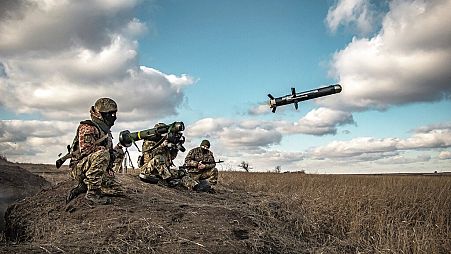 FILE - Ukrainian Defense Ministry Press Service, Ukrainian soldiers use a launcher with US Javelin missiles during military exercises in Donetsk region, Ukraine, 23/12/21.