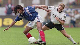 كريستيان كاريمبو في مباراة بين ألمانيا وفرنسا في شتوتغارت، 1996.