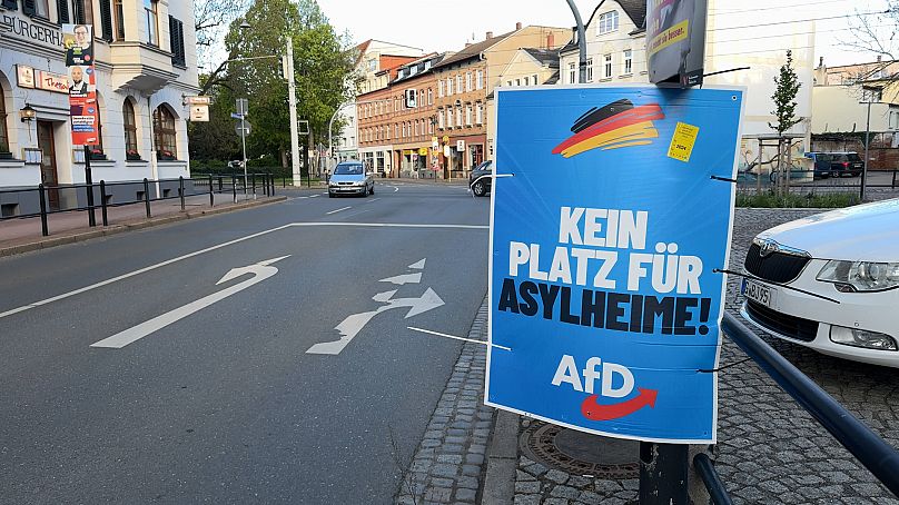 AfD poster in Thuringia reading "No place for asylum homes" in German