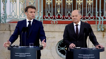 Scholz and Macron at press conference in Meseberg