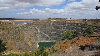 The open pit of the Greenbushes mine, Western Australia, seen from the public mine lookout.