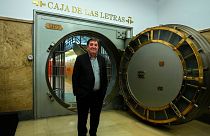 The Director of the Cervantes Institute, Luis Garcia Montero poses by the old bank vault 