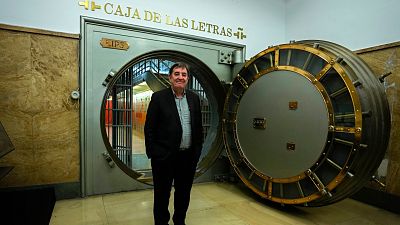 The Director of the Cervantes Institute, Luis Garcia Montero poses by the old bank vault 