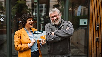 Belgian energy minister Tinne Van der Straeten and the president of energy cooperatives' association Dirk Vansintjan